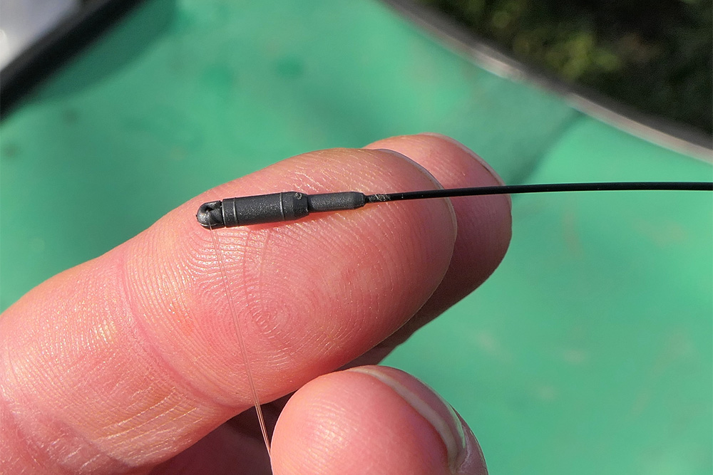 You can buy whip flick tip connectors like this from most tackle shops