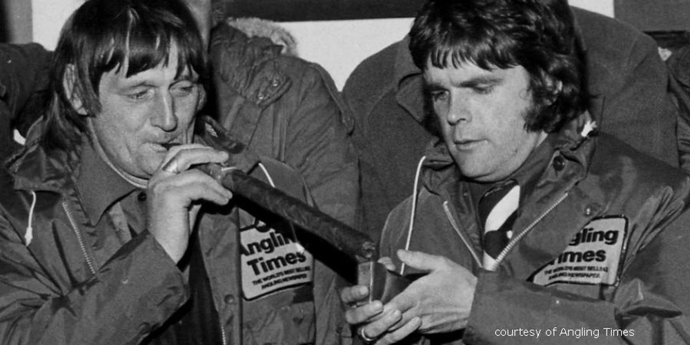 Percy Anderson has his cigar lit for him by Angling Times editor Bob Feetham after his 40lb bream catch (below) on the River Welland in 1974.