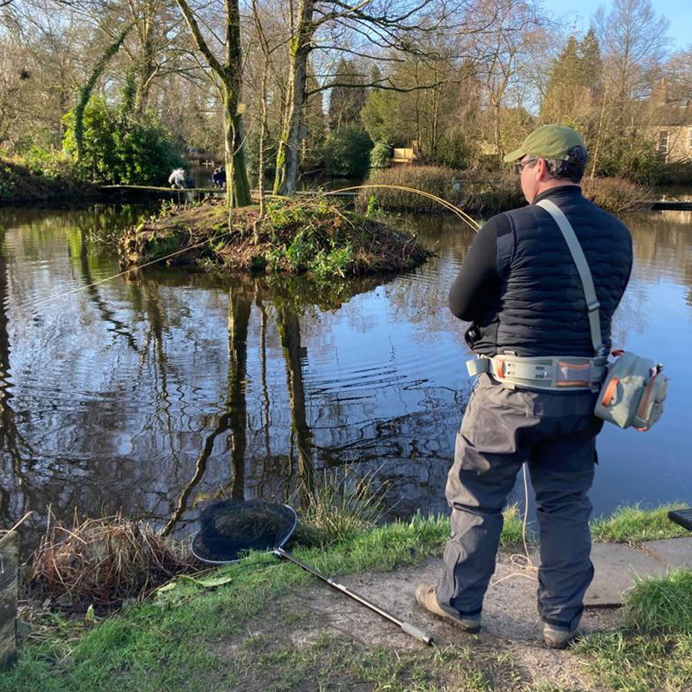 Jason playing a fish